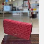 ⁦Original Michael kors Crossbody small bag Burgundy color⁩ - الصورة ⁦2⁩